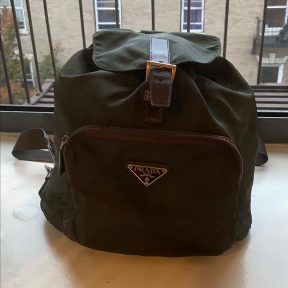 Authentic Army Green Prada backpack with buckles.